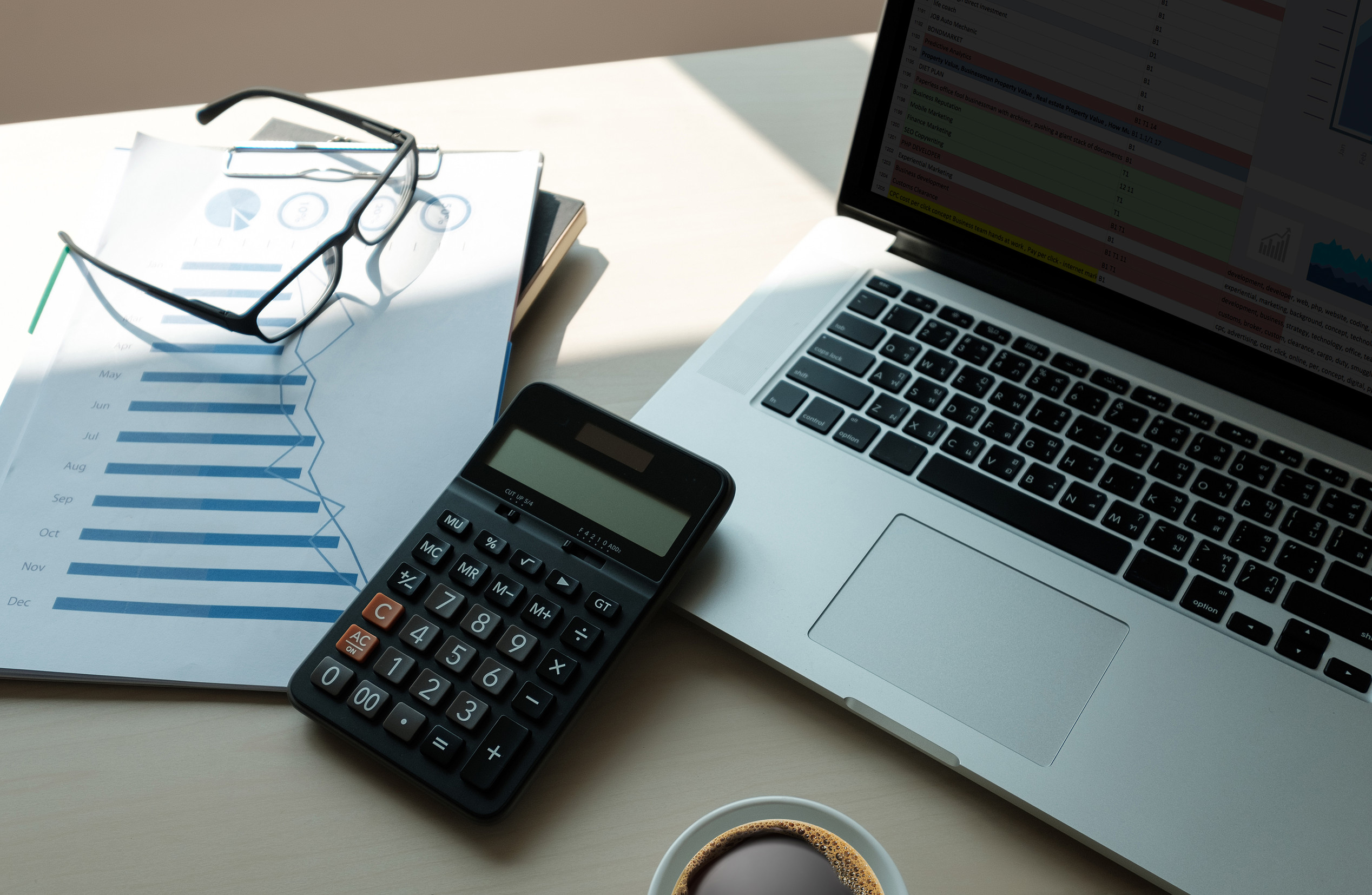 Close up businessman using calculator on documents Unrecognizabl